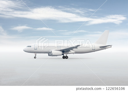 White passenger jetliner isolated on bright background with sky 122656106