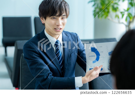 Business man having business talk in office Business man having business talk in office 122656635