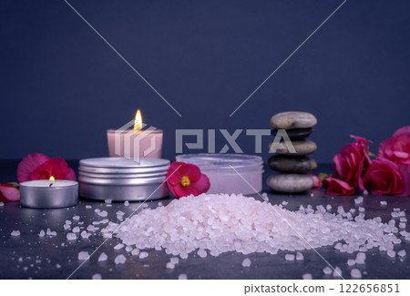 Bath salt with candles and body lotion for spa on black table 122656851