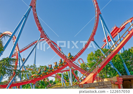 Roller Coaster in funny amusement park. Roller Coaster in funny amusement park. 122657050
