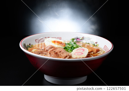 Hot ramen (soy sauce ramen) on black background Hot ramen (soy sauce ramen) on black background 122657501