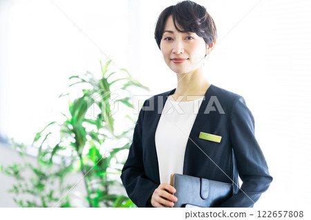 Middle-aged female manager working in a hotel 122657808