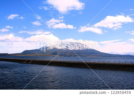 Sakurajima as seen from Yojiro Beach in Kagoshima City 122658459