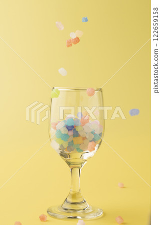 Colorful sugar candy falling down 122659158