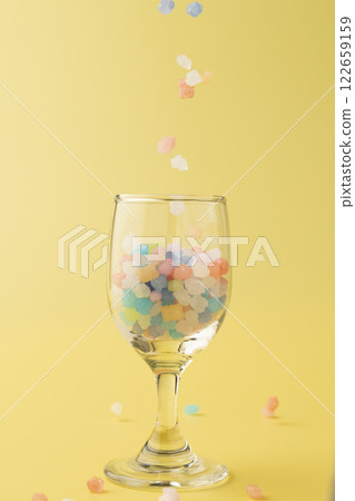 Colorful sugar candy falling down 122659159