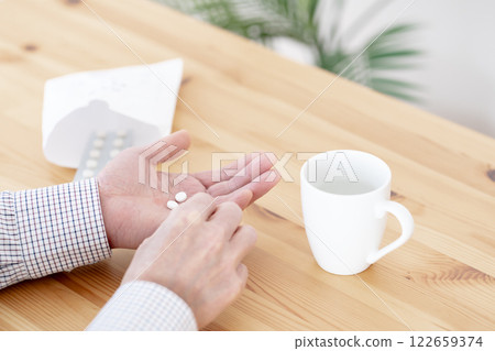 The action of taking medicine, Taking medicine, Taking medicine 122659374