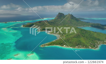 Aerial view of Bora Bora green tropical island with clear turquoise water coral reef, popular tourist destination in south pacific ocean. Wild travel destination, remote exotic summer nature paradise 122661974