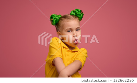 against pink studio background. 122662250