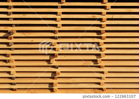 Drying boards in the air. Sawmill production of wood material Drying boards in the air. Sawmill production of wood material 122663107