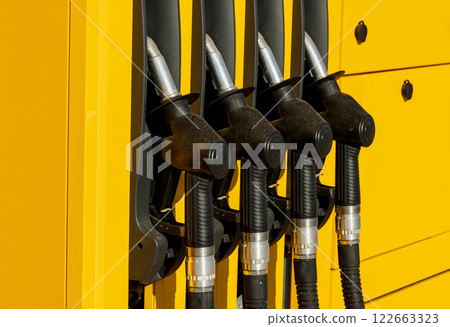 Fuel pumps station close up. Nozzles at the gas station 122663323