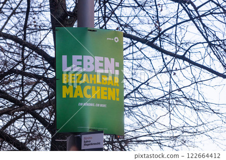 Berlin, Germany - January 13, 2025: Election campaign poster of the German political party Bundnis 90  Die Grunen (German for Alliance 90 / The Greens), the slogan is Life: making it affordable 122664412