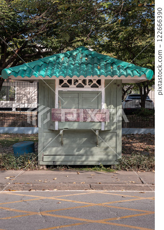 Front view of Security guard olive green booth (Guardhouse) in public park. Front view of Security guard olive green booth (Guardhouse) in public park. 122666390