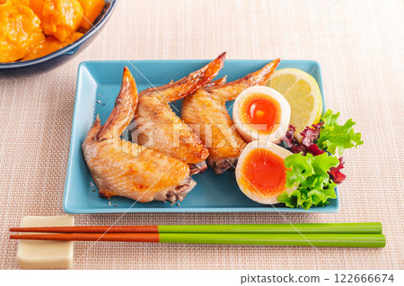 Salt-grilled chicken wings and boiled egg Salt-grilled chicken wings and boiled egg 122666674