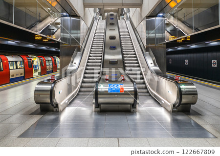 London Underground Escalators Leading to Subway Platform 122667809
