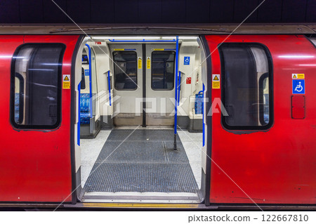 Open Doors of a London Underground Train. Iconic Red Tube Carriage Open Doors of a London Underground Train. Iconic Red Tube Carriage 122667810
