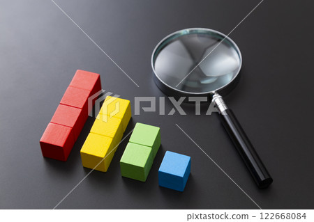 Building block graph and magnifying glass 122668084