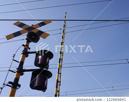 Blue sky and railroad crossing 122669841