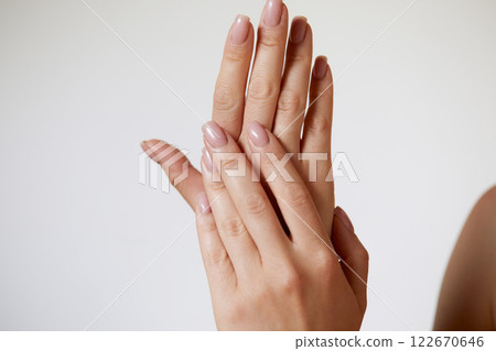 Beautiful Woman hand closeup. Manicure and Hands Spa. Manicured nails and Soft hands skin. Cosmetology, beauty. Skin care 122670646