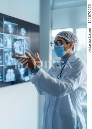 doctor in lab coat and mask examines holographic medical images doctor in lab coat and mask examines holographic medical images 122670976