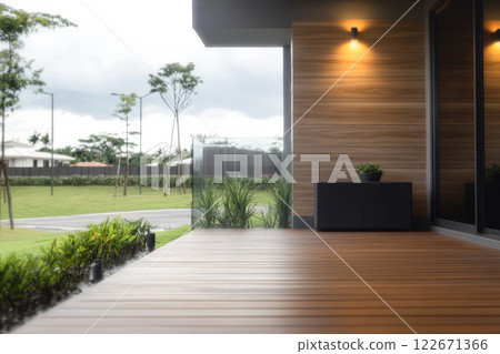Modern outdoor patio with wooden flooring and garden view in a suburban area 122671366