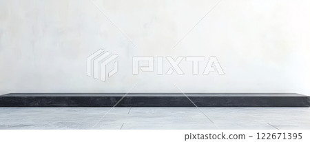 Minimalist black shelf against a textured white wall in a modern space Minimalist black shelf against a textured white wall in a modern space 122671395