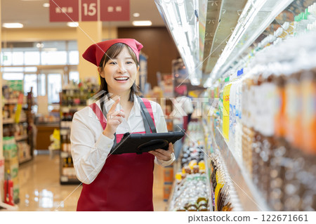 People working at a supermarket (property release obtained) People working at a supermarket (property release obtained) 122671661