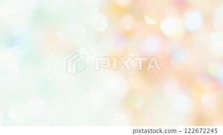 Beautiful orange-green pale sparkling background, soft pastel color bokeh 122672245