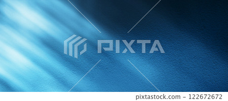 Blue light rays on dark blue background. Abstract blue light background. 122672672