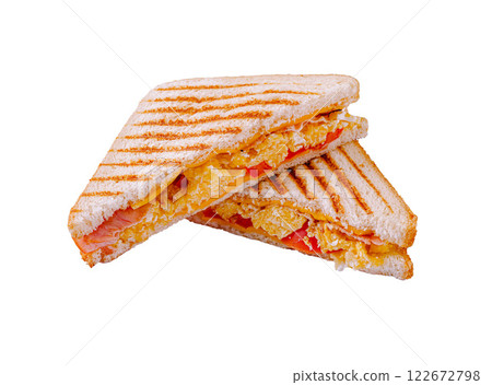 Delicious grilled sandwich with layers of cheese, ham, and tomato served on a crisp afternoon Delicious grilled sandwich with layers of cheese, ham, and tomato served on a crisp afternoon 122672798