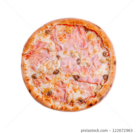 Delicious pizza topped with ham and sausage ready to be served at a cozy restaurant in the evening Delicious pizza topped with ham and sausage ready to be served at a cozy restaurant in the evening 122672963