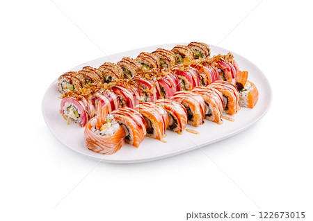Colorful sushi platter showcasing various rolls arranged neatly for a delightful dining experience at a casual restaurant 122673015