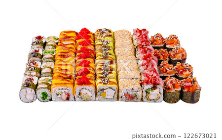Colorful sushi assortment beautifully arranged on a white surface ideal for a gourmet meal or celebration event Colorful sushi assortment beautifully arranged on a white surface ideal for a gourmet meal or celebration event 122673021