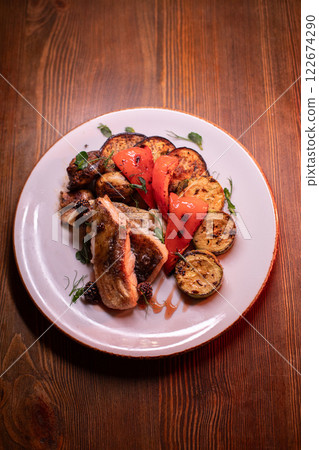 Restaurant dish fish with vegetables: zucchini 122674290