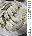 Dumplings before baking 122674415