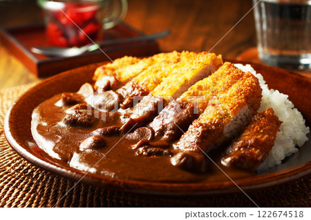 Katsu curry topped with thick pork cutlet 122674518