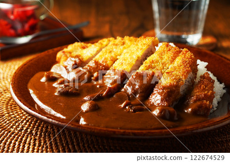 Katsu curry topped with thick pork cutlet Katsu curry topped with thick pork cutlet 122674529