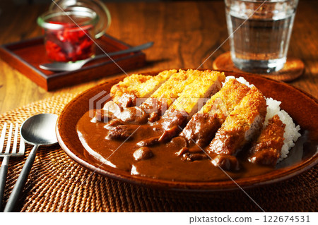 Katsu curry topped with thick pork cutlet Katsu curry topped with thick pork cutlet 122674531