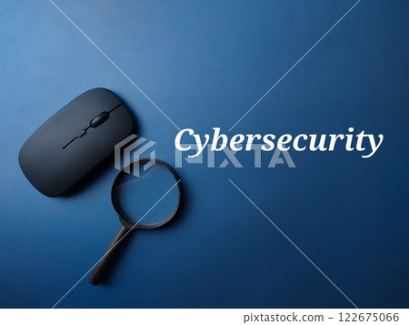 Black mouse and magnifying glass with word Cybersecurity on a blue background. 122675066