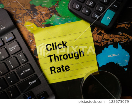 Keyboard,magnifying glass and calculator with text Click Through Rate on a world map. Keyboard,magnifying glass and calculator with text Click Through Rate on a world map. 122675079