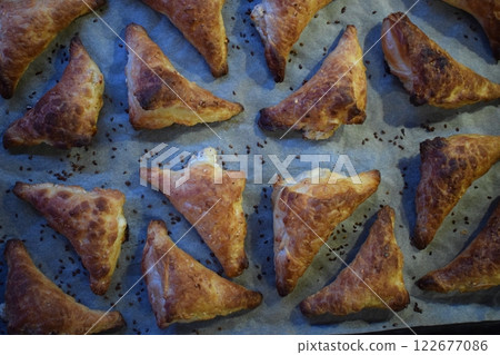 Freshly Baked Golden Brown Triangular Cake Freshly Baked Golden Brown Triangular Cake 122677086