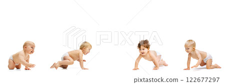 Babies crawling in various directions, some looking forward, others turning heads, illustrating movement, energy, determination, capturing early stages of mobility. 122677297