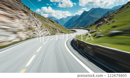 Fast driving on winding mountain road with blurred motion 122679805