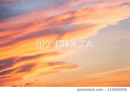 changing weather forecast. global warming. red clouds on the bue evening sky. dramatic sunset background. bloody sundown. powerful wind changing weather forecast. global warming. red clouds on the bue evening sky. dramatic sunset background. bloody sundown. powerful wind 122680056
