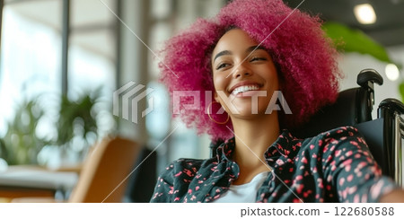 A happy and inclusive black African American woman in a wheelchair with pink afro hair enjoys a bright office atmosphere, radiating positivity A happy and inclusive black African American woman in a wheelchair with pink afro hair enjoys a bright office atmosphere, radiating positivity 122680588