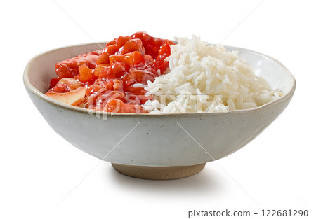 bowl of basmati rice with red sweet and sour chicken sauce 122681290