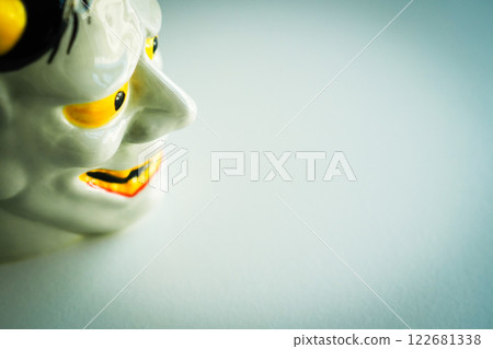 Ceramic face of Hannya (a demon of the dead) Copy space 122681338