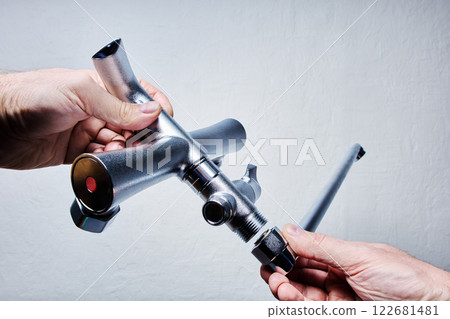 Assembling bathtub faucet with hand shower and long spout. 122681481