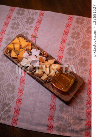 A cheese plate for serving in a restaurant 122681527