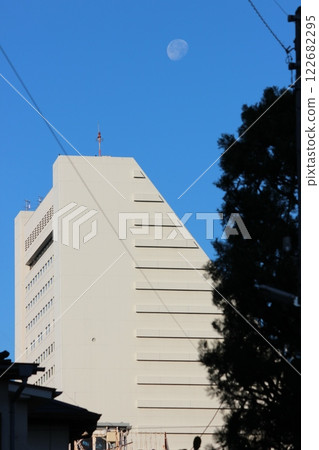 Blue sky and white moon 122682295