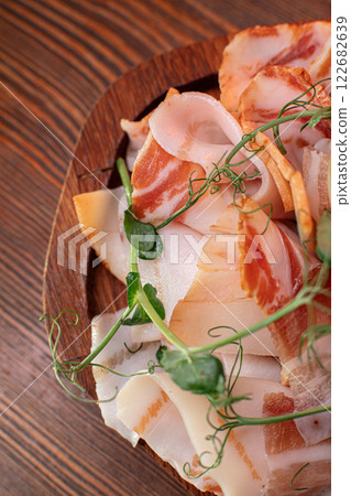Beautiful slicing of fat and delicious fresh bacon Beautiful slicing of fat and delicious fresh bacon 122682639